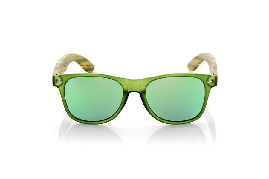 Wood eyewear of Bamboo SKA GREEN. The Ska green sunglasses are made with the Matt Transparent green PC front and the colour-laminated bamboo wood sideburns with a green pattern, combined with various colors of lenses that suit your style. Frontal measurement: 148x50mm for Wholesale & Retail | Root Sunglasses® 